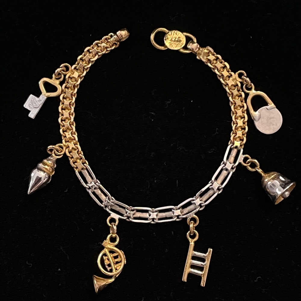 22K gold charm bracelet. Two tone gold bracelet